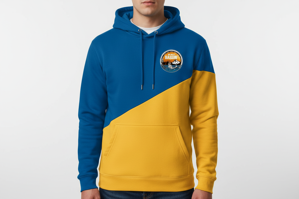 Person wearing Big Willy Bassin' royal blue and yellow hoodie